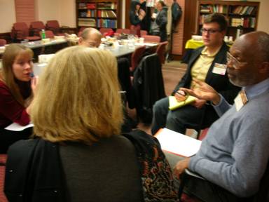 Ray Kea (U of California, Riverside, right of camera) leading a small-group discussion.
