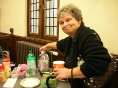 Susan Noakes at the beverage table.